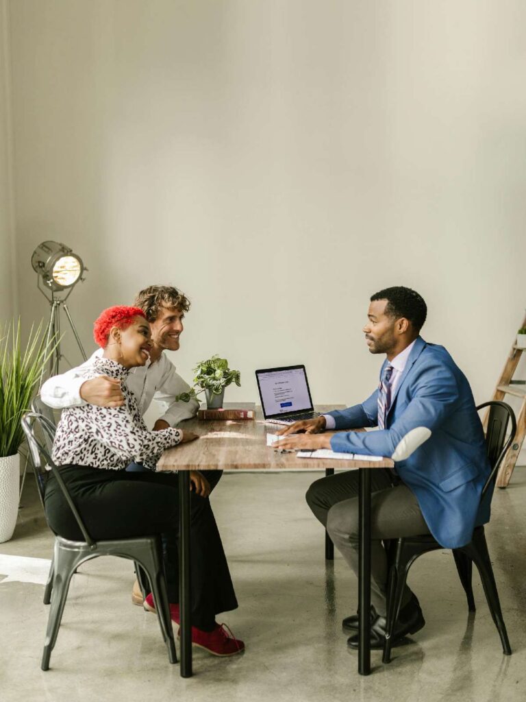 Corporate Tax 4 Couple Meeting with Financial Advisor or Consultant in Modern Office