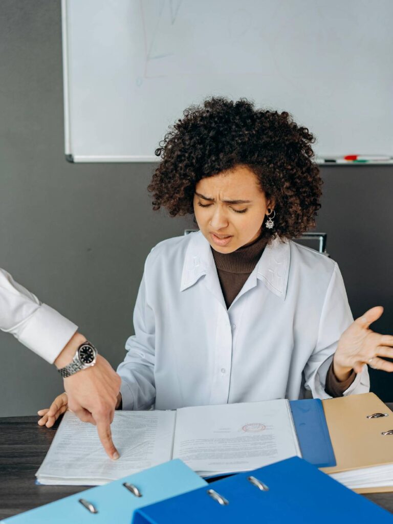 Corporate Tax 5 Woman Expressing Frustration During a Business Meeting or Legal Discussion